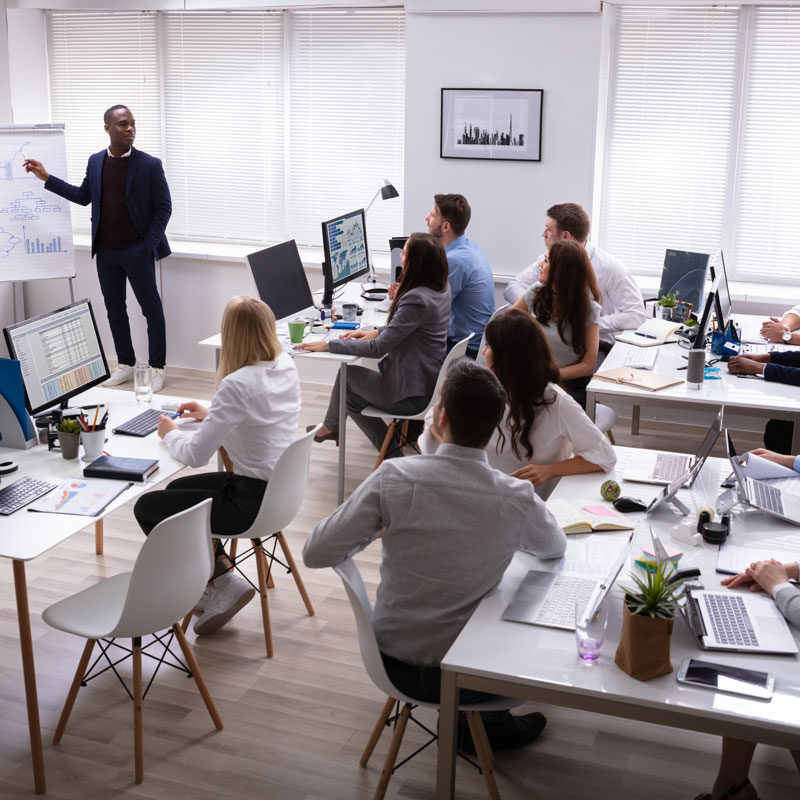 training2.jpg (An African Businessman Giving Presentation To His Colleagues)